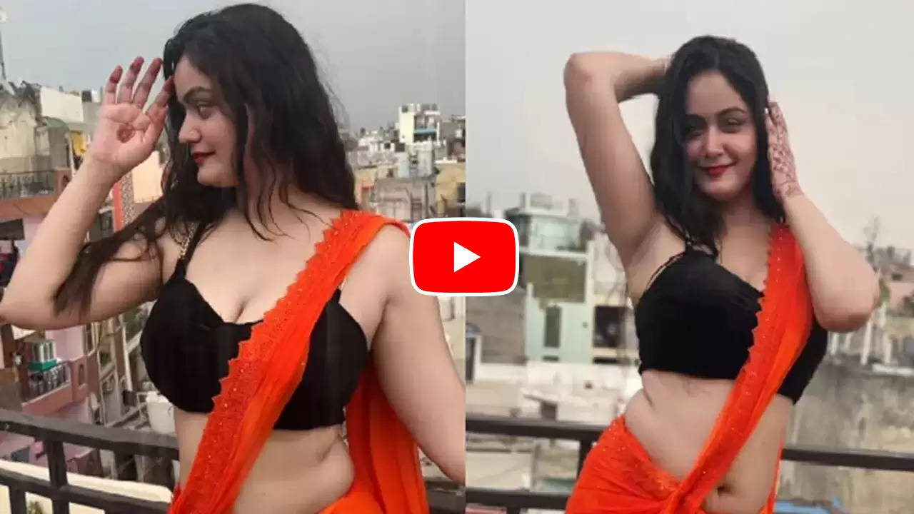 Sexy Hot Video : भीगी देसी भाभी ने बनायीं हॉट रील, बारिश में फ्लॉन्ट किया कर्वी फिगर, फैंस की निकलीं आहें 